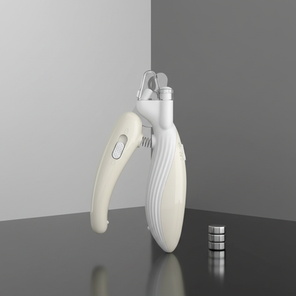 Cortador de unhas pet branco/bege sobre superfície refletora