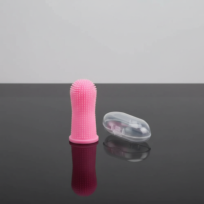 Escova de dedo rosa para pets – fotografia comercial